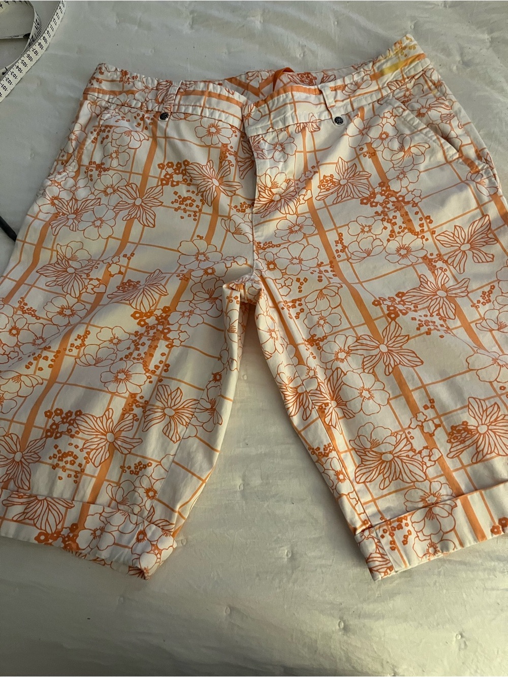 Athleta orange and white Bermuda shorts